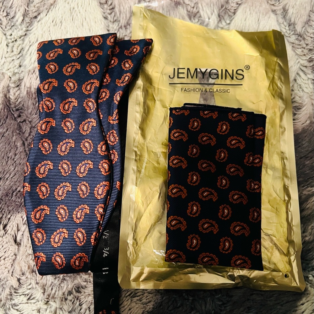 Men’s bow tie and pocket square, paisley pattern, navy and orange, brand new.